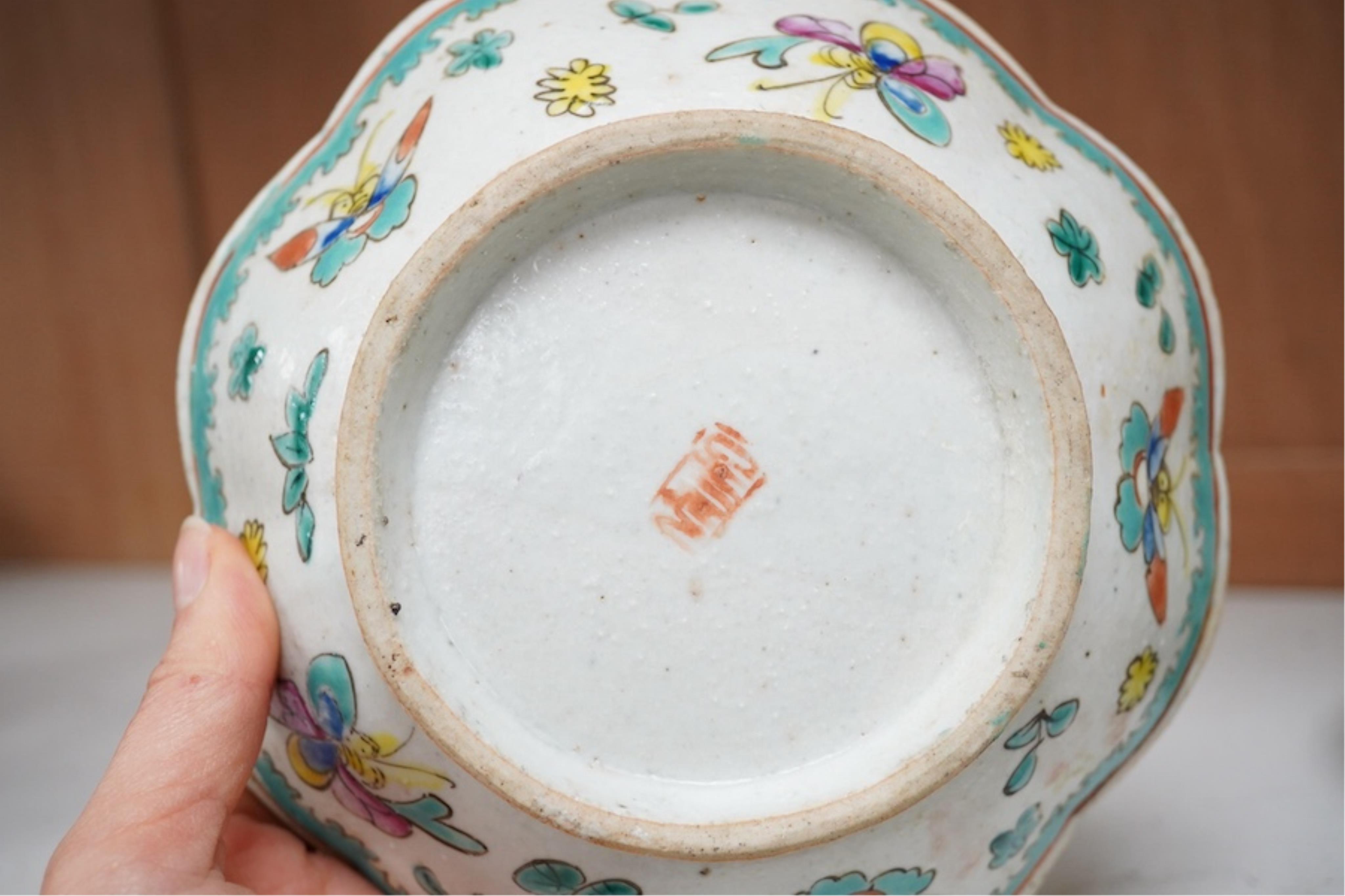 Three Chinese famille rose dishes, late Qing and a famille rose teapot, highest dish 5cm. Condition - fine chip to plate